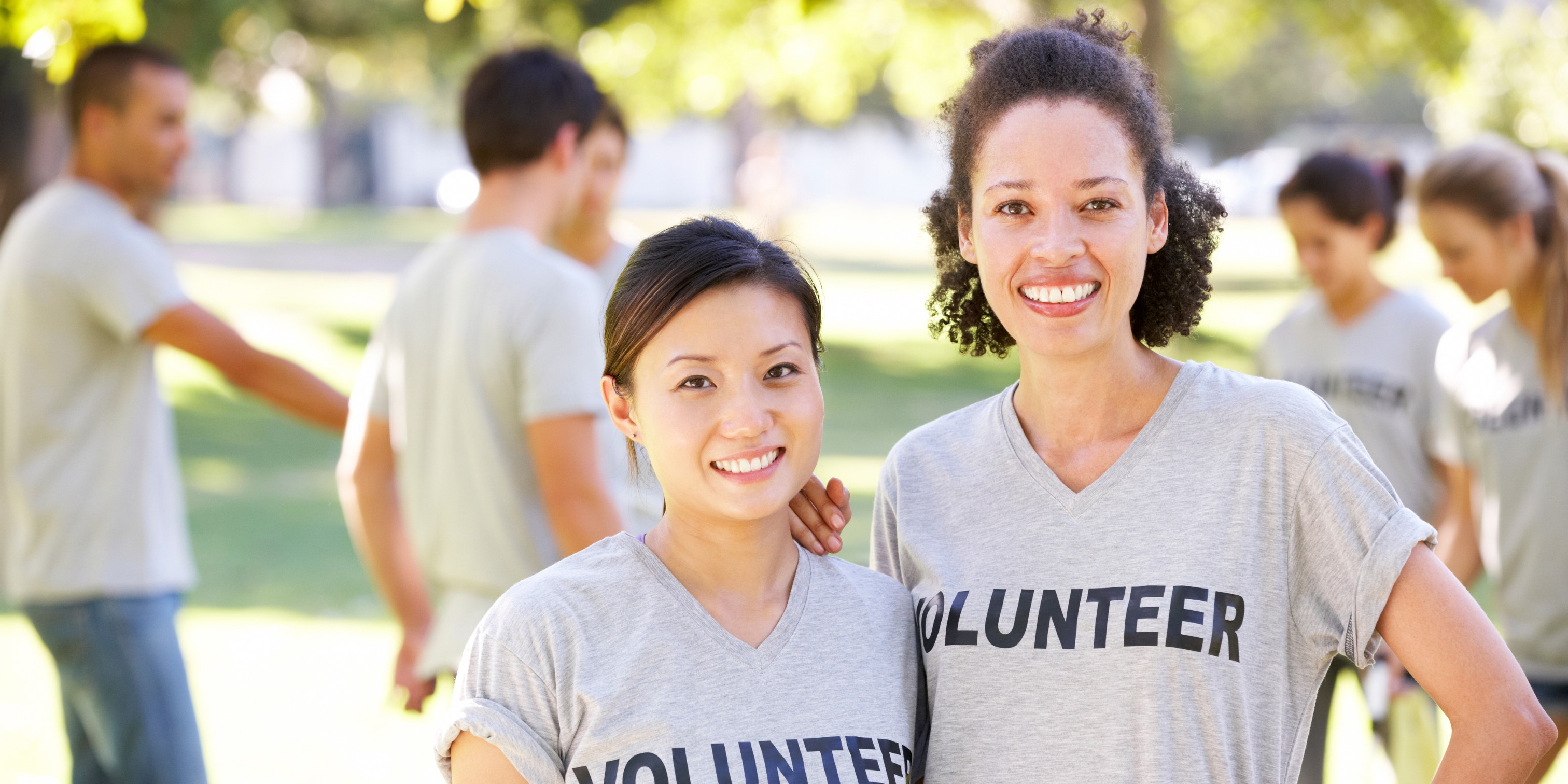 Women with volunteer t-shirts
