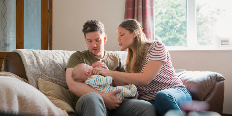 family with crying baby