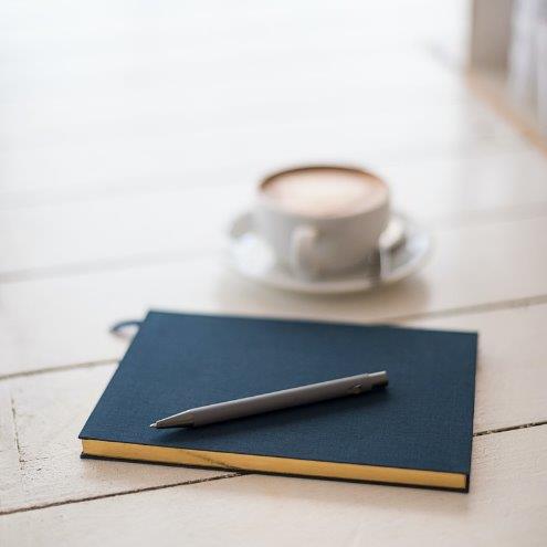 cup of tea and notebook