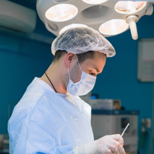 Surgeon operating in an operating theatre