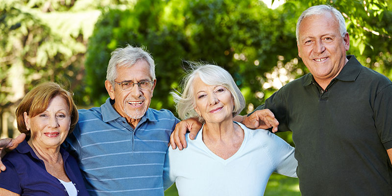 Four elderly people in the park