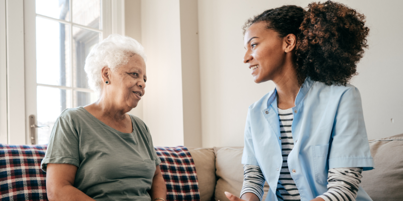 Clinician speaking to patient