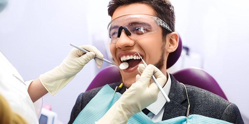 Man getting dental exam