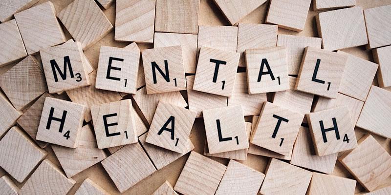 Wooden blocks spelling out the words 'mental health'