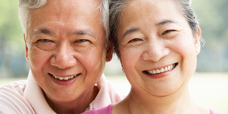 Image of an older couple smiling