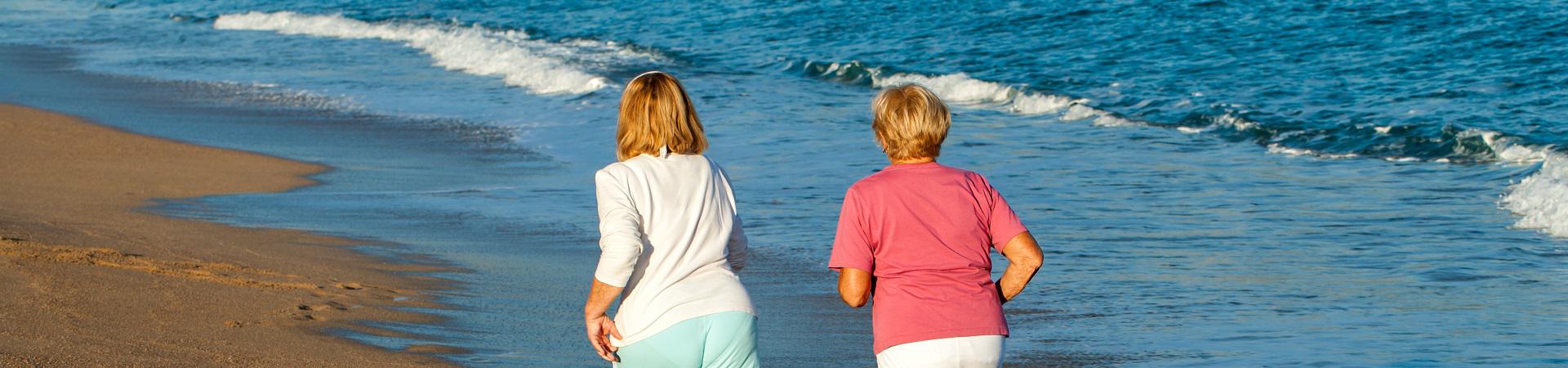 Ladies jogging on beach