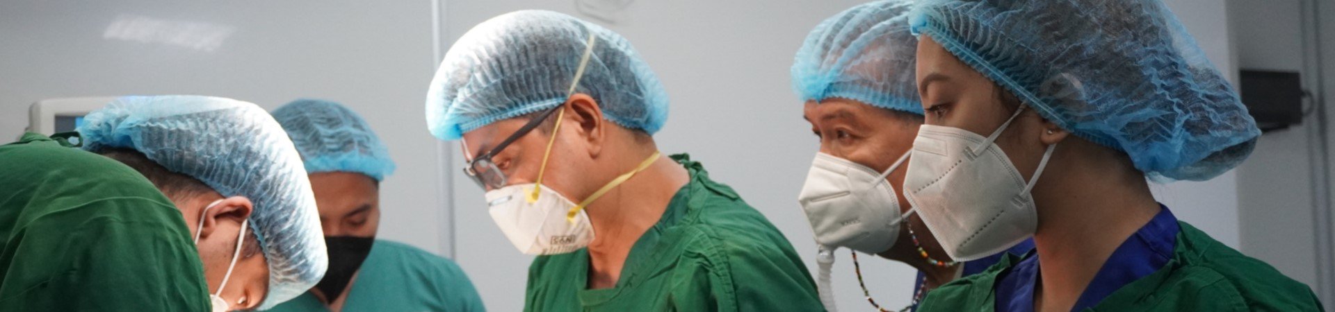 surgeons in operating theatre attire